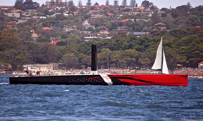 The US supermaxi Comanche on Sydney Harbour on Monday December 1, 2014 © Michael Chittenden 